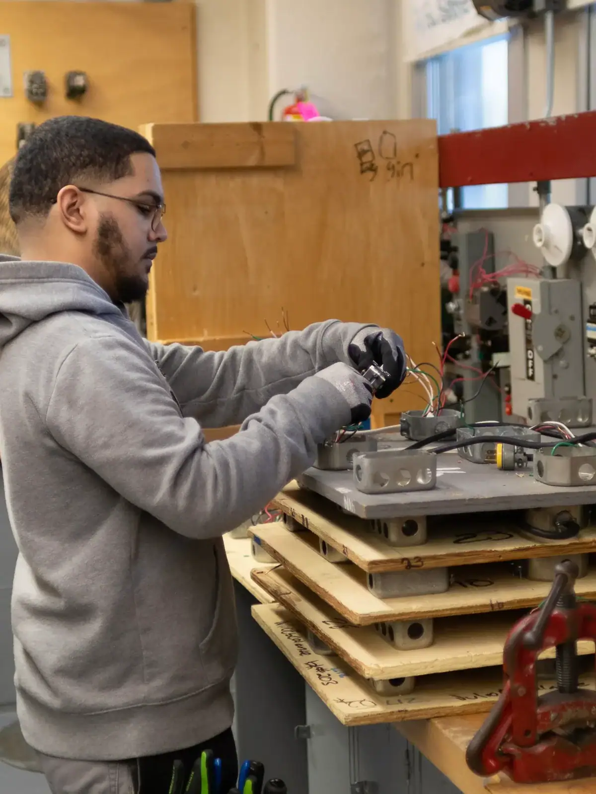 Student works on configuring wires.